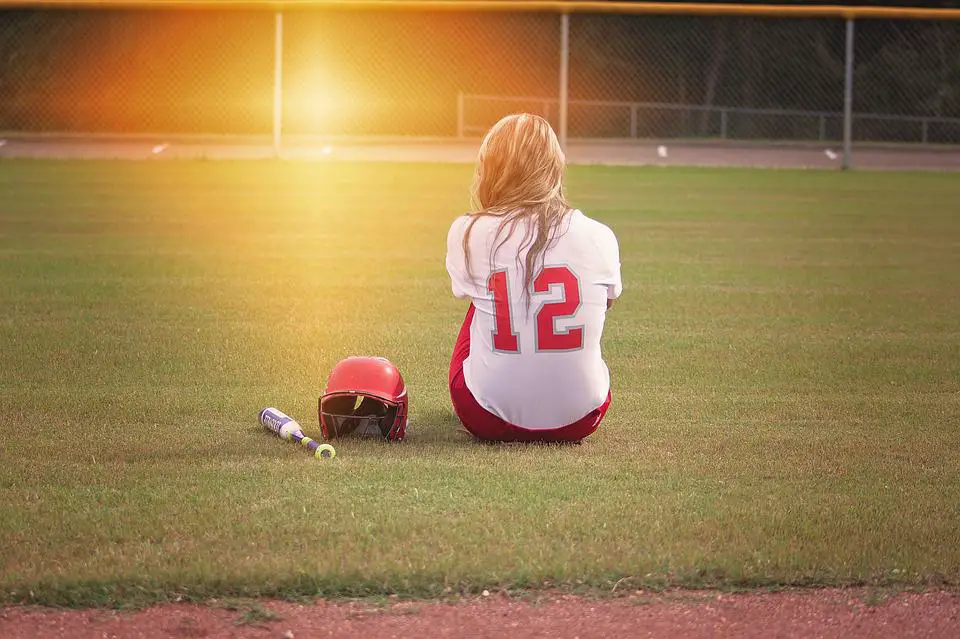 girl sitting in the field